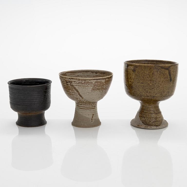 Kyllikki Salmenhaara, three stoneware goblets signed KS Arabia and KS.