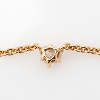 Necklace, 18K gold with heart-shaped diamond.
