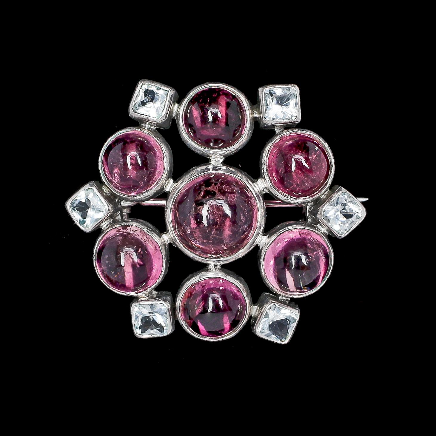 BROSCH, silver med bergkristall och rosa turmaliner, Hugo Strömdahl, Stockholm, 1959.