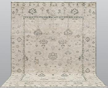 An oriental carpet,  ca 304 x 248 cm.