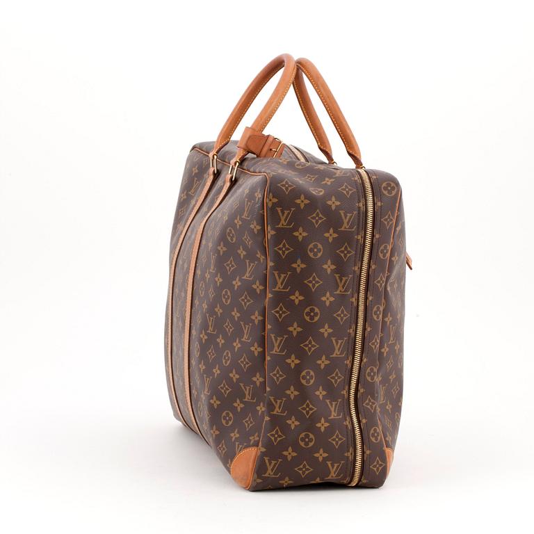 LOUIS VUITTON, a monogram canvas travelling bag "Sirius".