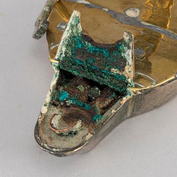 An 18th century bronze oil lamp.