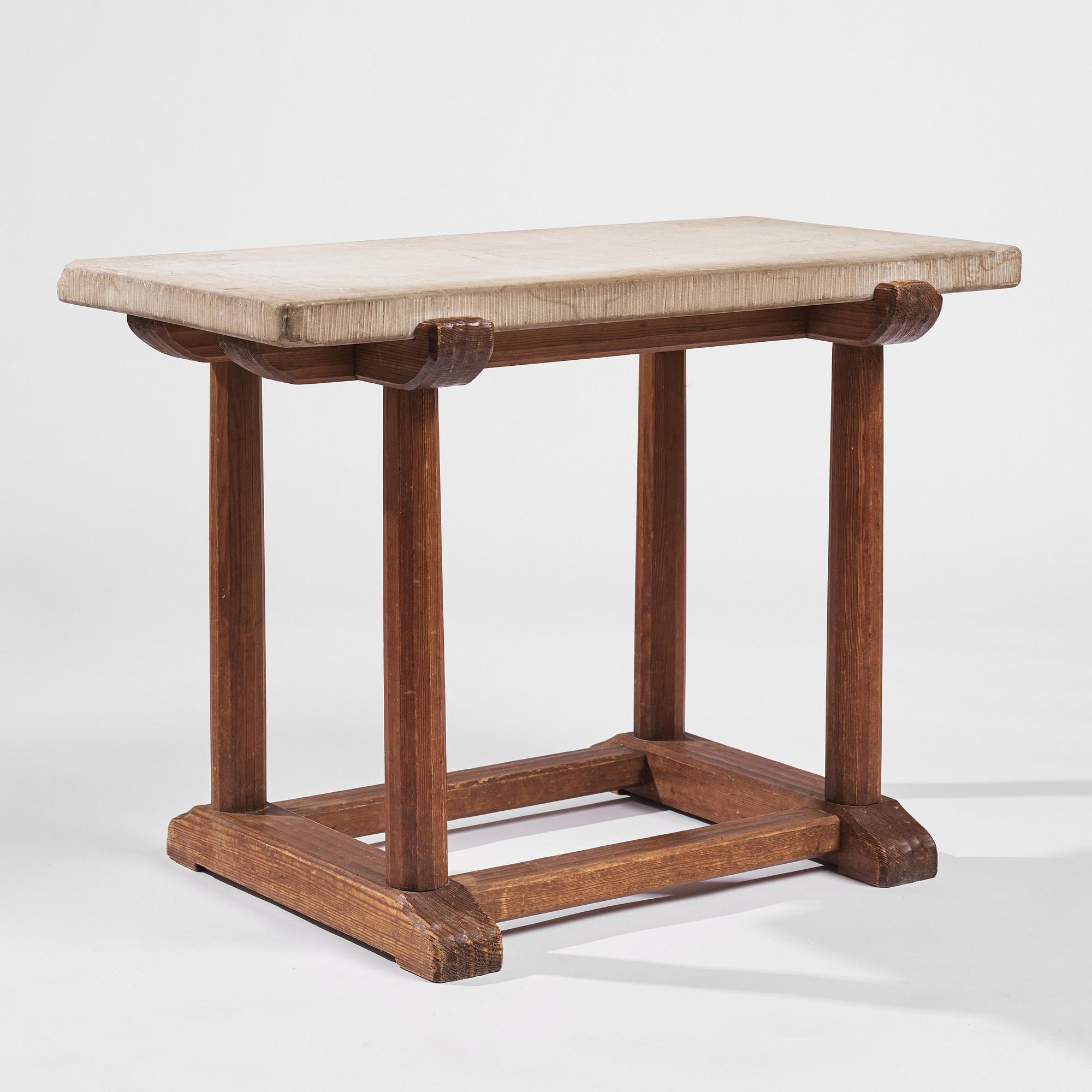 Axel Einar Hjorth, a stained pine and limestone top "Sandhamn" table, Nordiska Kompaniet, Sweden 1931.