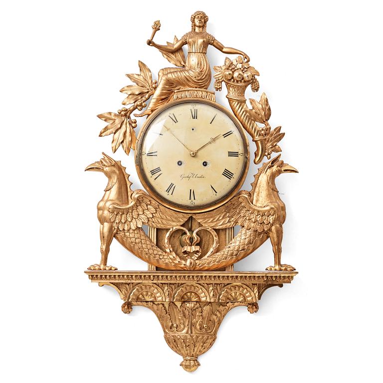 A Swedish Empire wall clock by G Undén.