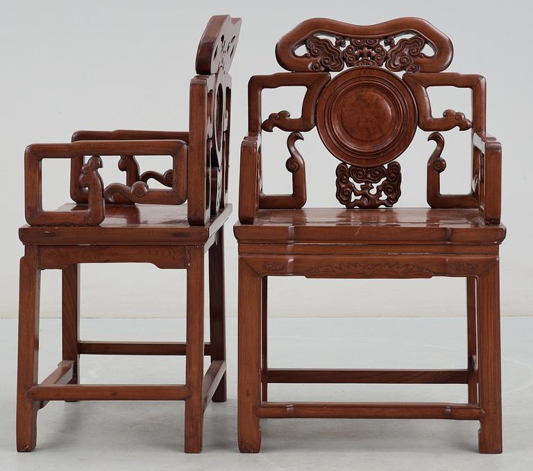 A pair of hardwood armchairs, Qing dynasty.