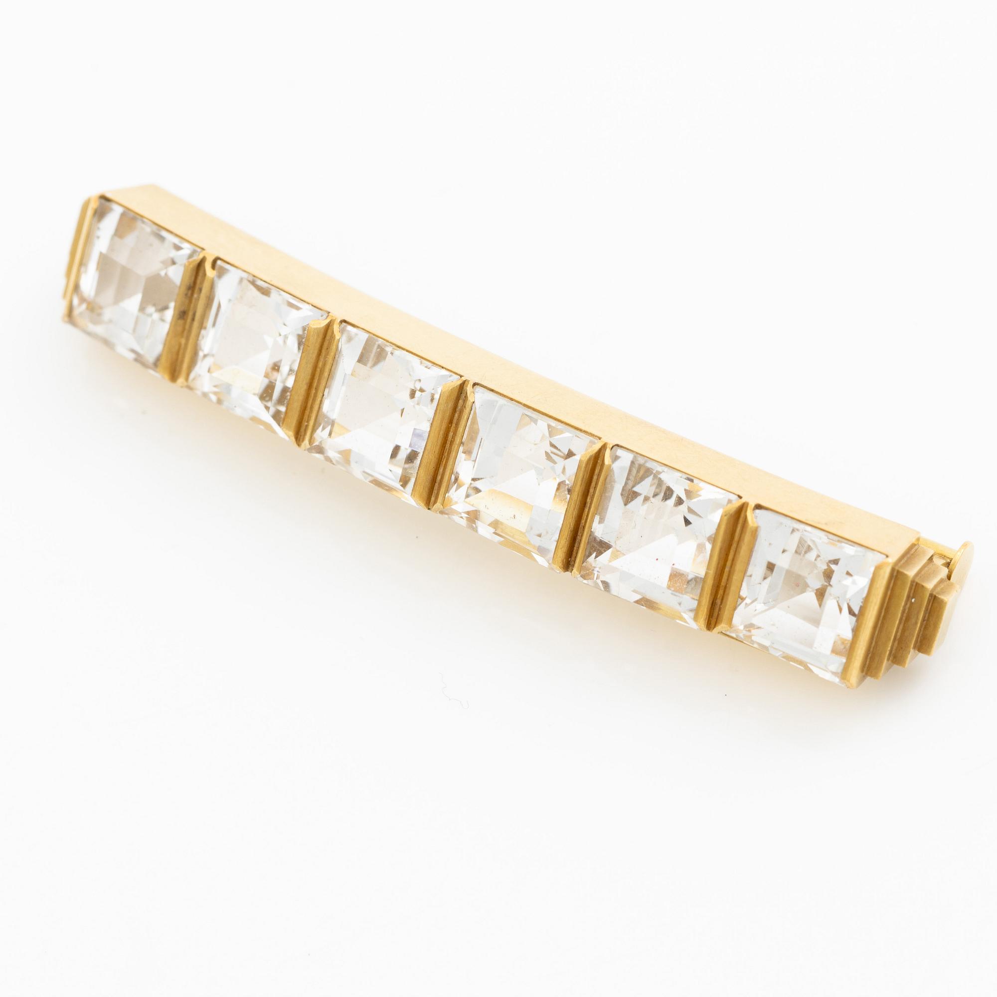 Wiwen Nilsson, a brooch, 18K gold with faceted rock crystal, Lund 1942.