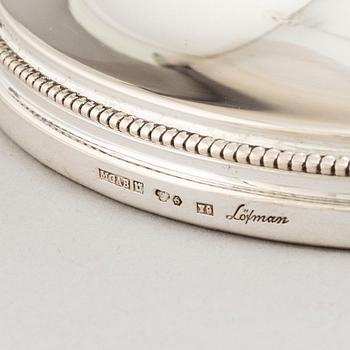 A set of four Swedish silver candlesticks, maker's mark Erik Löfman, Uppsala 1971-1973.