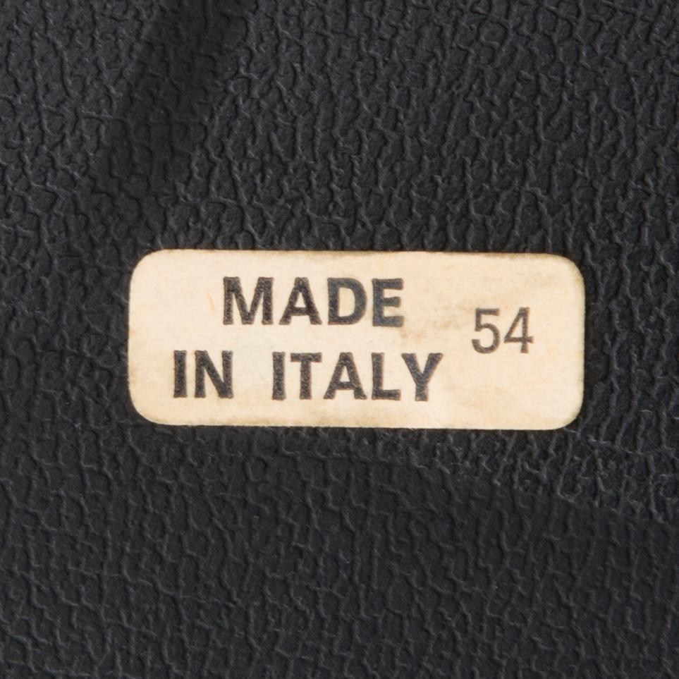 A Set of Three Chrome and Black Leather Chairs.