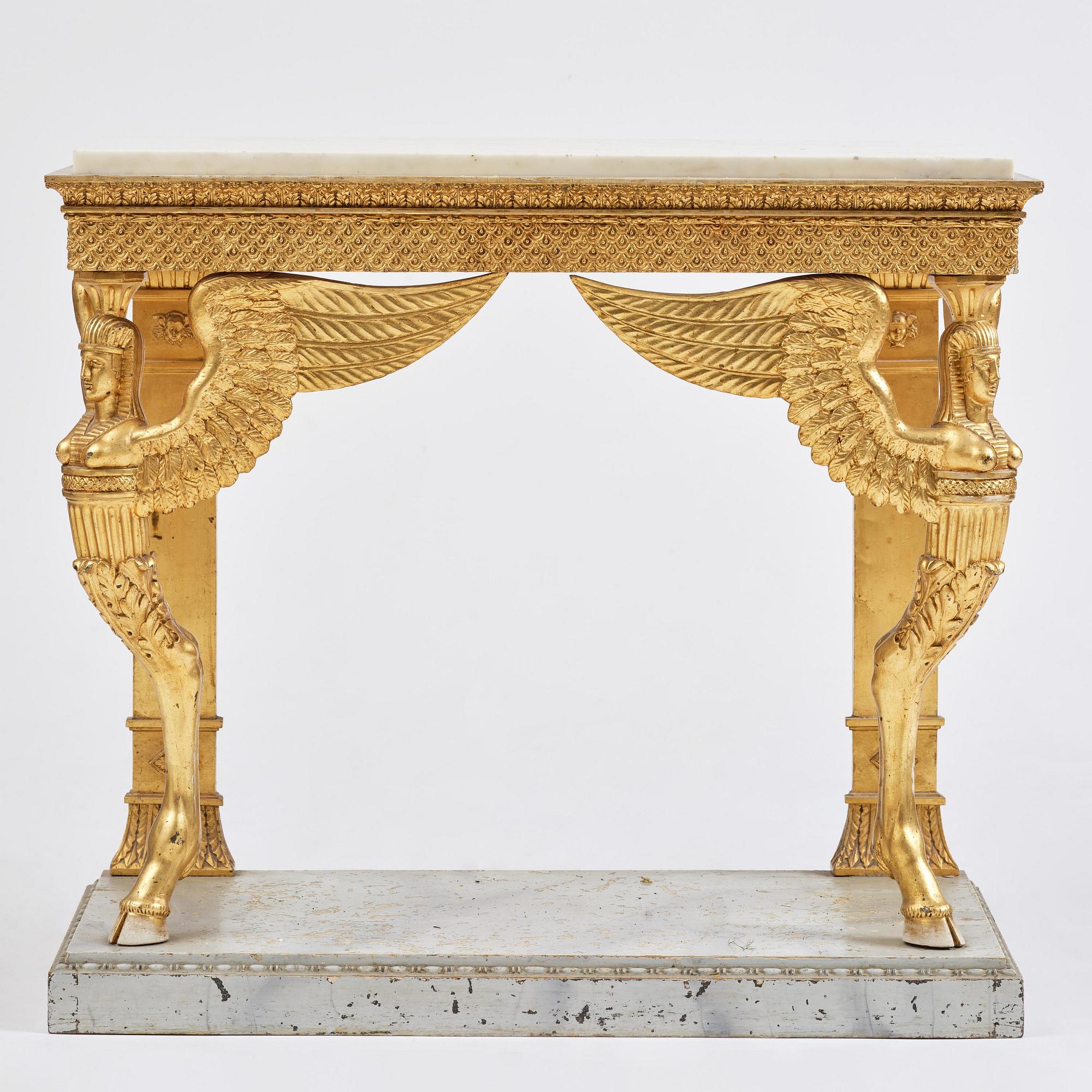 A late Gustavian giltwood console in the manner of J. Frisk, Stockholm, early 19th century.