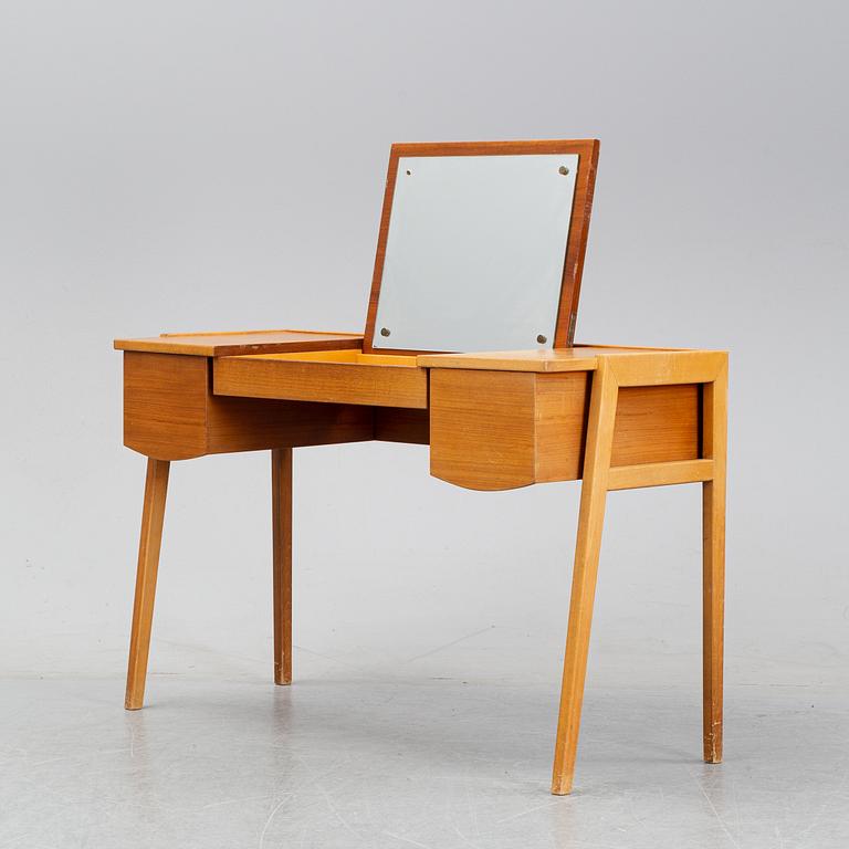 A 1960's teak dressing table.
