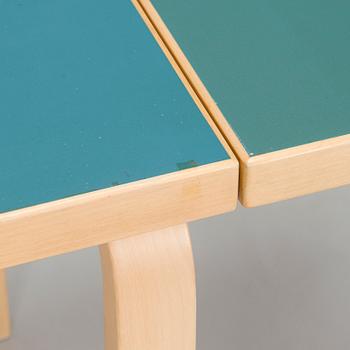 Alvar Aalto, A mid-20th century drop leaf table and three chairs for O.Y. Huonekalu-ja Rakennustyötehdas A.B.