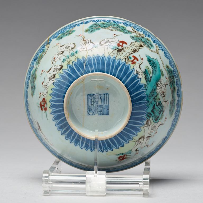 A pair of famille rose bowls, late Qing dynasty, with Qianlong mark.