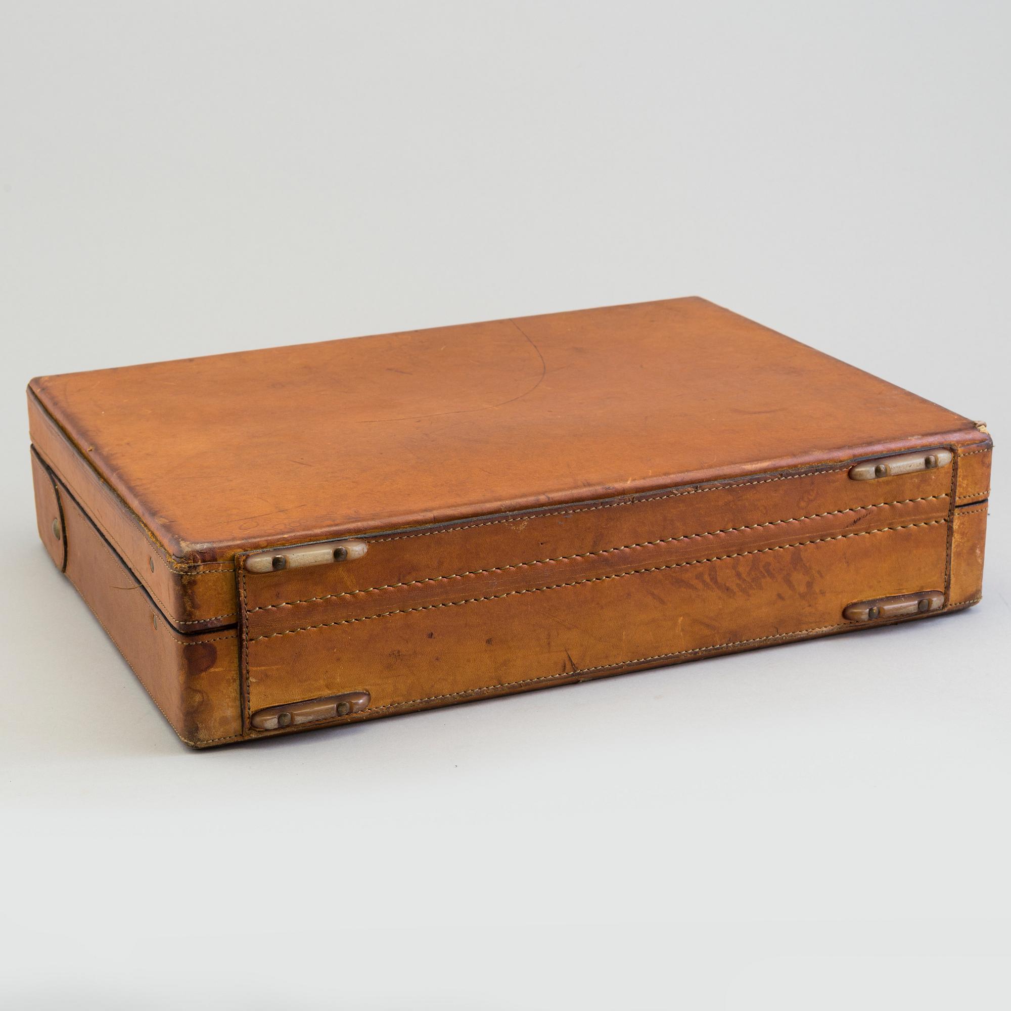 A leather brifcase, Hartman.