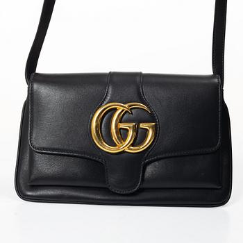 Gucci, a handbag.