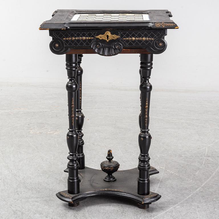 A porcelain and wooden mounted chess table, late 19th century.