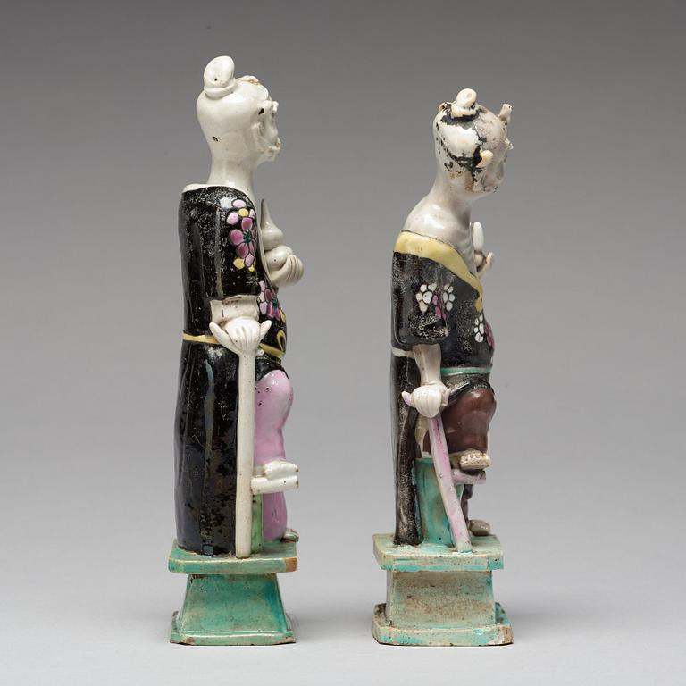 A pair of famille rose figures of 'Immortals', Qing dynasty, late 18th Century.