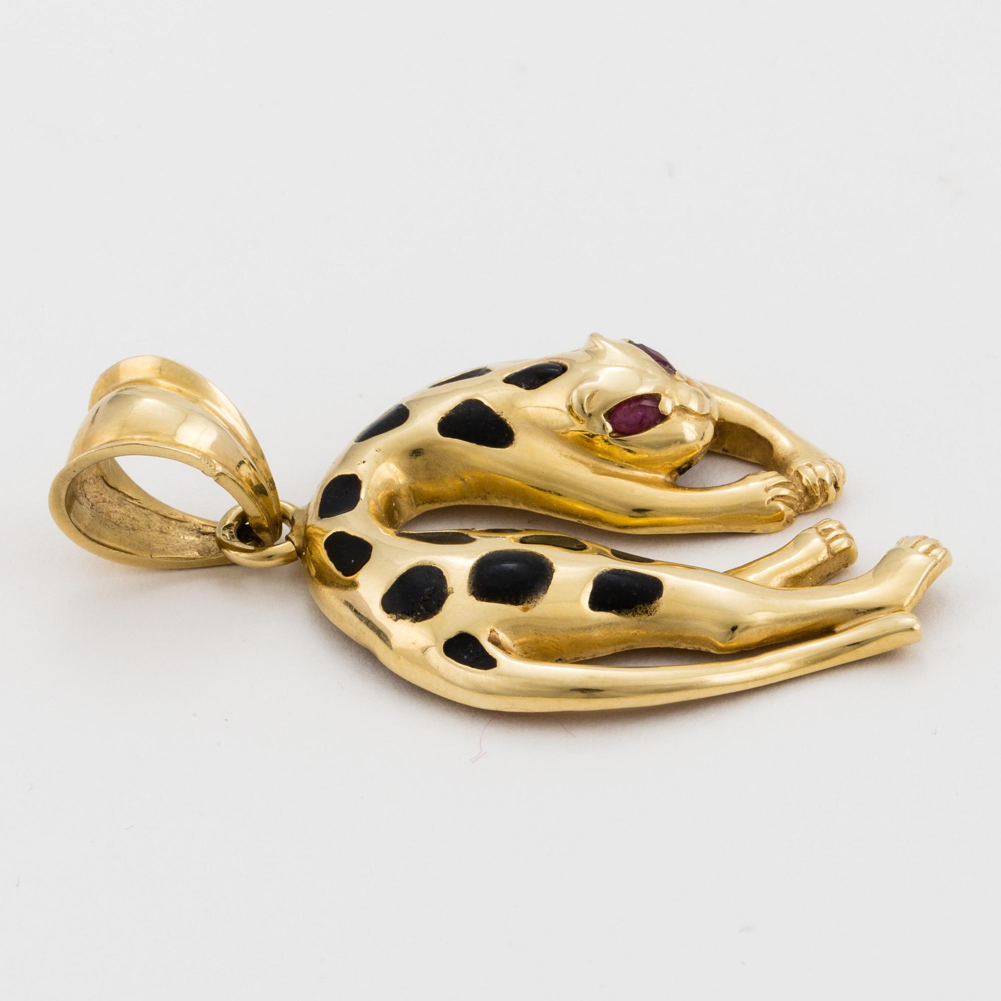 A pendant in the shape of a leopard.