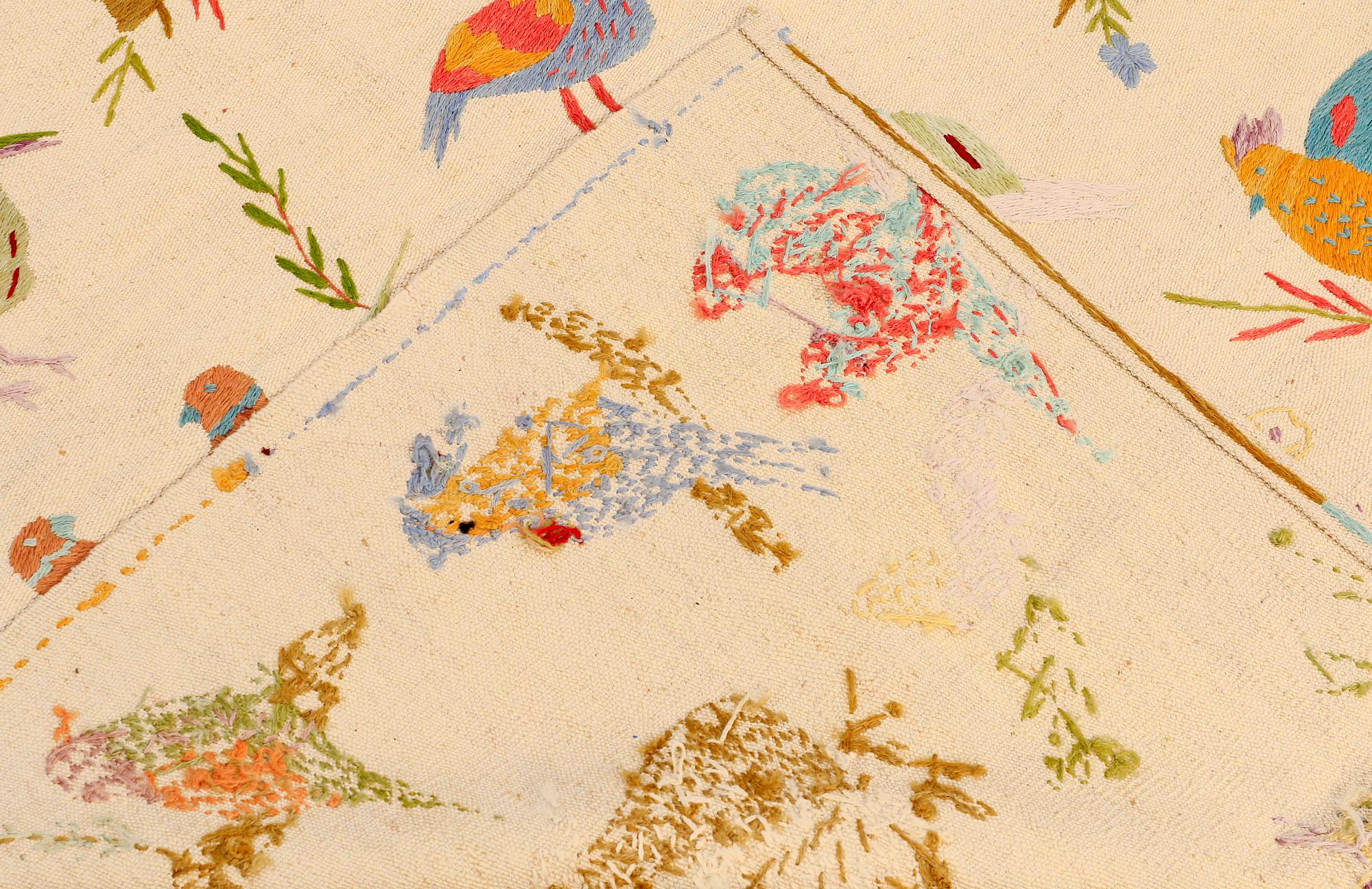 A carpet, embroided flat weave, ca 171 x 131 cm.
