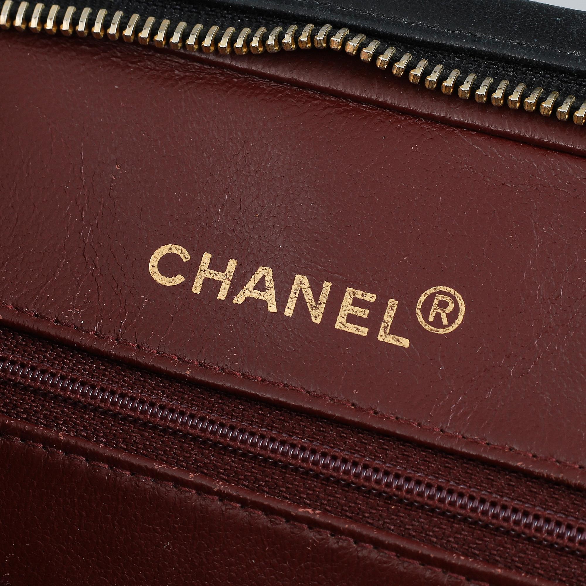 Chanel, a black leather handbag, 1980's.