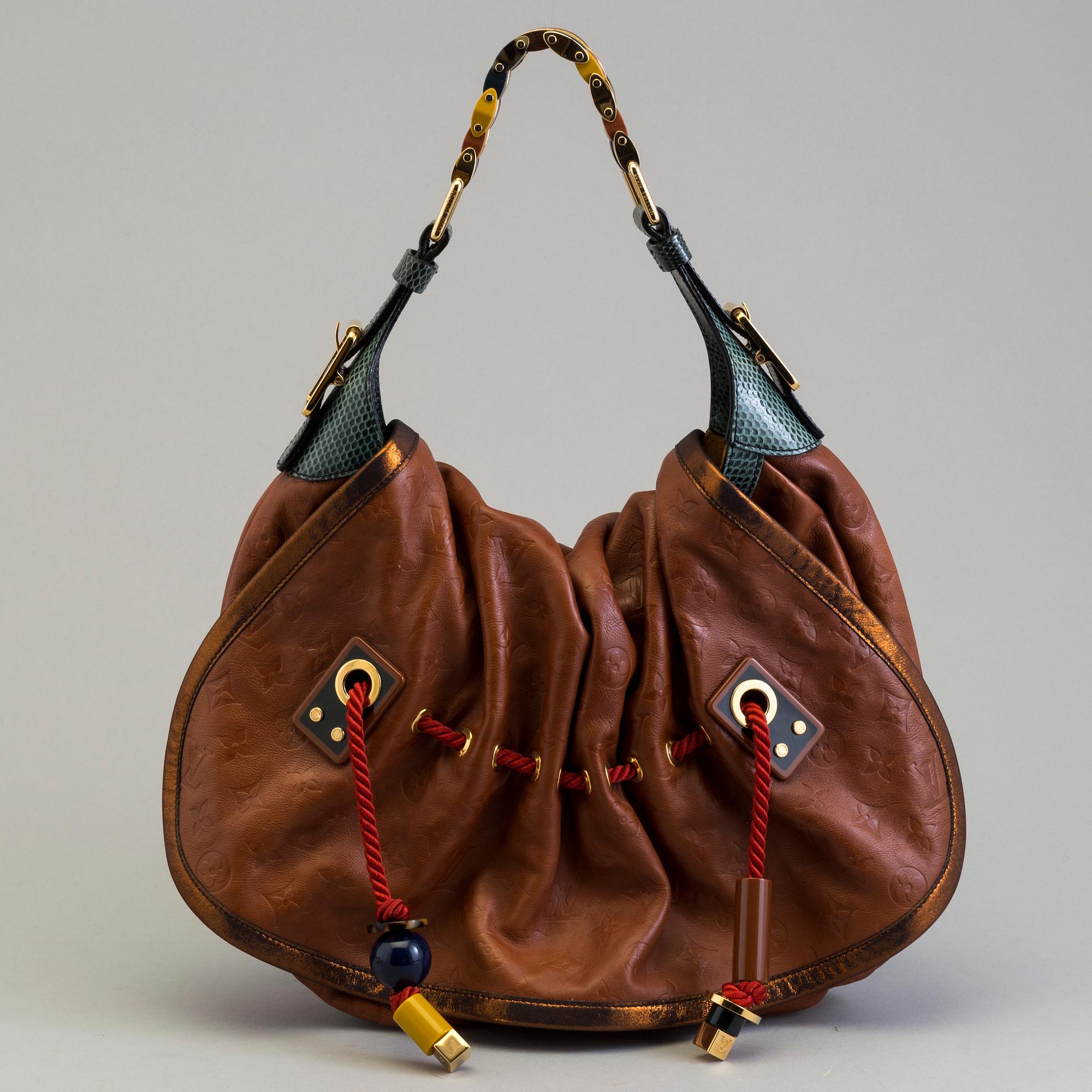 Louis Vuitton Limited Edition Monogram Epices Kalahari GM Bag.
