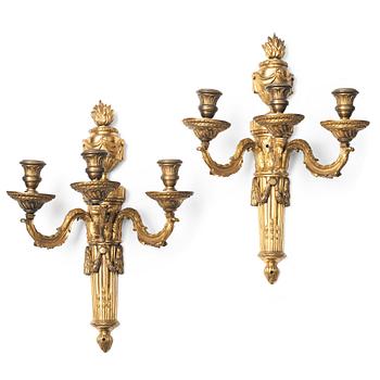 A pair of presumably Gustavian three-light wall-lights, late 18th century.