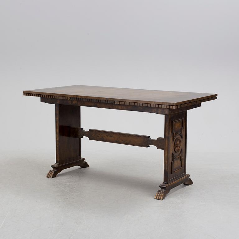 A 1920´s dinner table and six chairs probably designed by Axel Einar Hjorth for AB Svenska möbelfabriken Bodafors.