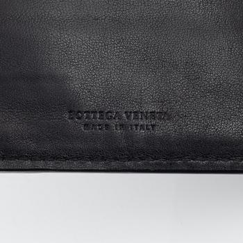 Bottega Veneta, a wallet and bracelet.
