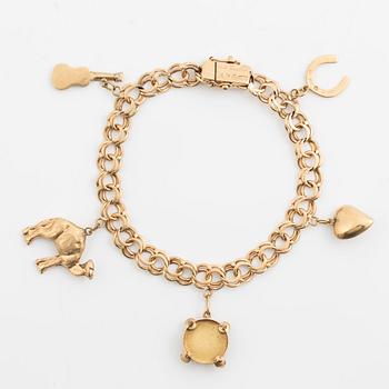 Armband 18K guld bismarcklänk, med berlocker.