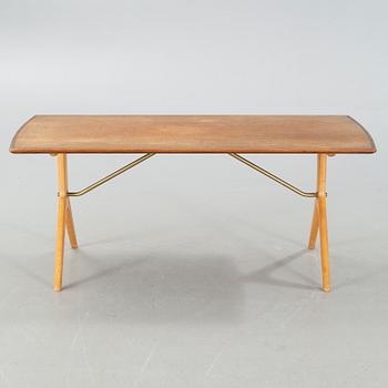 A "Krysset" sofatable, designed by Karl-Erik Ekselius for JO Carlsson, launched 1952.