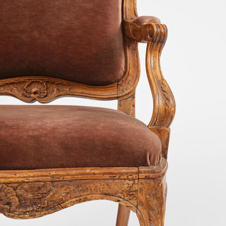A pair of rococo fauteuils, Stockholm, later part 18th century.
