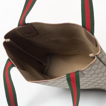 Gucci,.