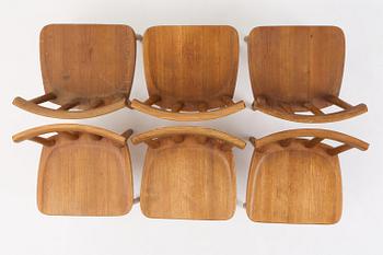 Axel Einar Hjorth, a set of six stained pine "Utö" chairs, Nordiska Kompaniet, Sweden, 1930s.