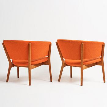 Nanna Ditzel, a pair of teak lounge chairs, Søren Willadsen, Denmark, 1950-60's.