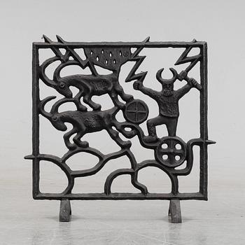 A cast iron fire place screen, Olle Hermansson, Husqvarna, from the second half of the 20th century.