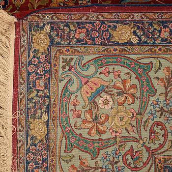 A CARPET, a semi-antique Tabriz, ca 339 x 253,5 cm.