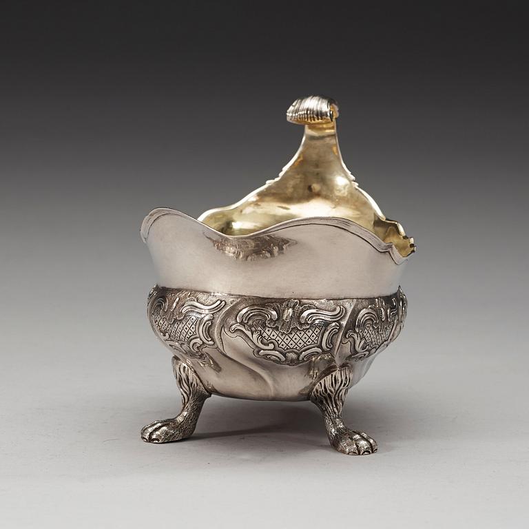 A Swedish mid 18th century parcel-gilt sauce-boat, marks of Kilian Kelson, Stockholm 1755.