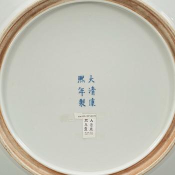 A large famille verte charger, Qing dynasty, 19th Century, with Kangxis six character mark.