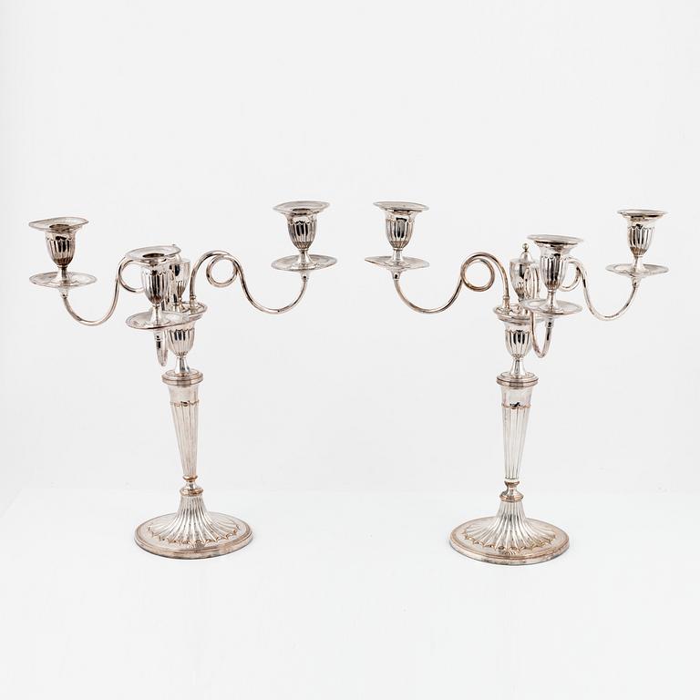 A pair of silver plated candelabra/candlesticks, England, first half of the 20th Century.
