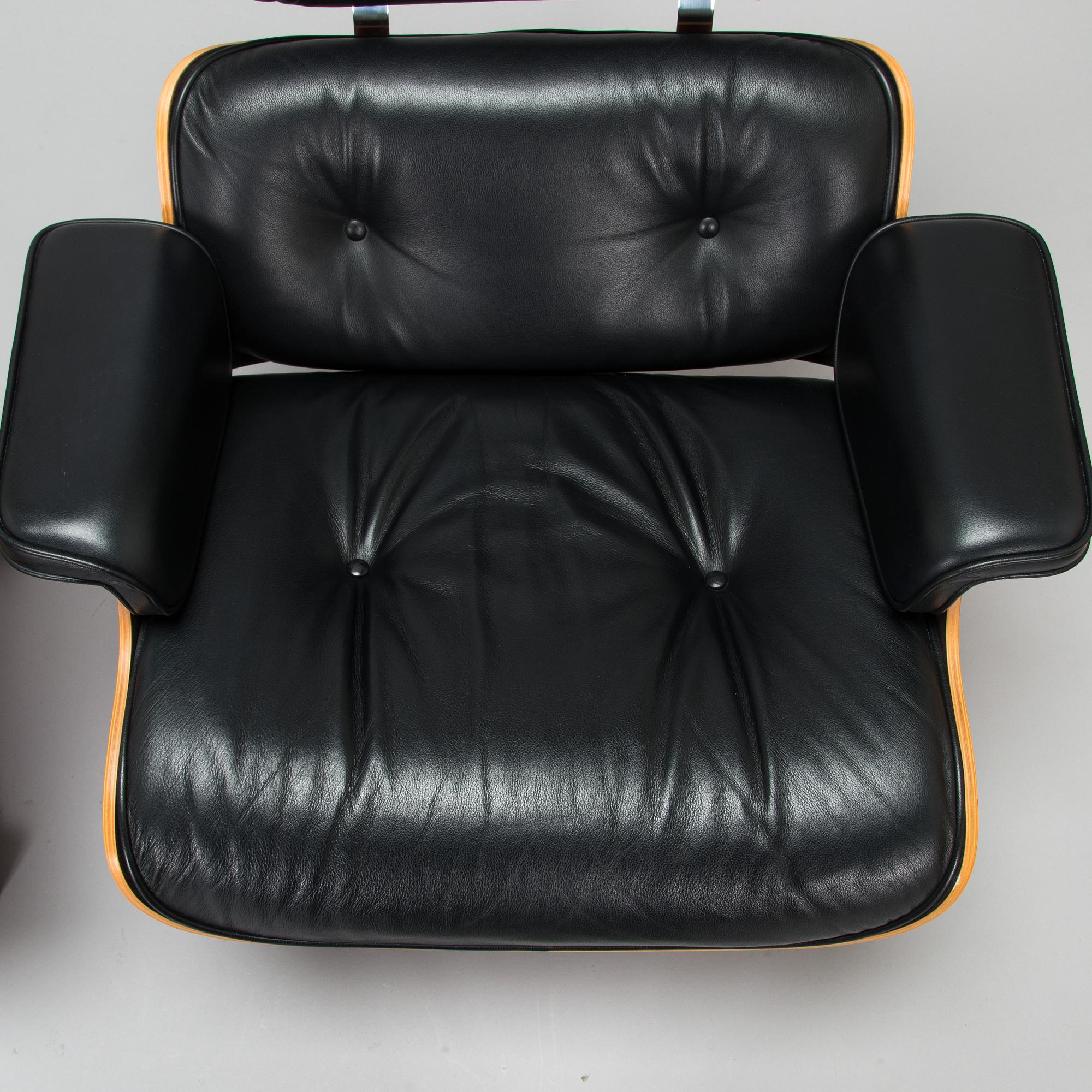 Charles and Ray Eames, a 'Lounge chair' and stool for Vitra 2006.