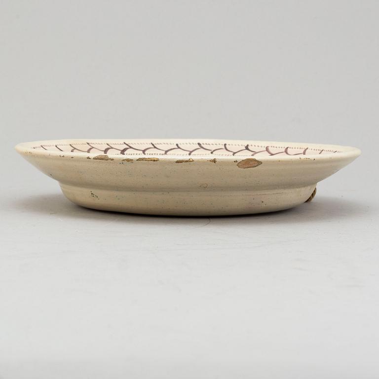 An faience dish dated 1816.