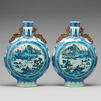 764. A pair of doucai moonflasks, Qing dynasty, 19th Century.