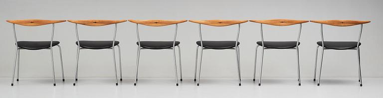 Hans J. Wegner, a set of six "JH-701" oak and black leather chairs by Johannes Hansen, Denmark.