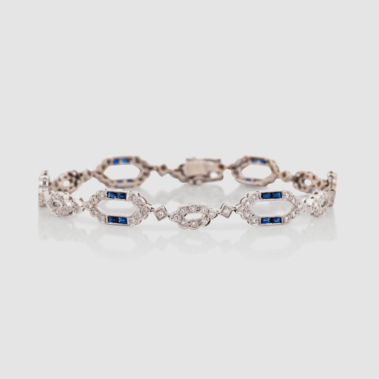 A diamond, 0.87 ct in total, and sapphire, 1.54 cts in total, bracelet.
