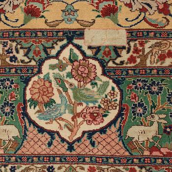 A carpet, old Tabriz part silk figural, ca 263,5 x 177 cm.