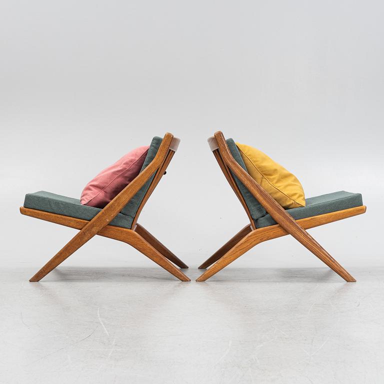 Folke Ohlsson, a pair of oak Frisco easy chairs, Nodafors, 1960s.