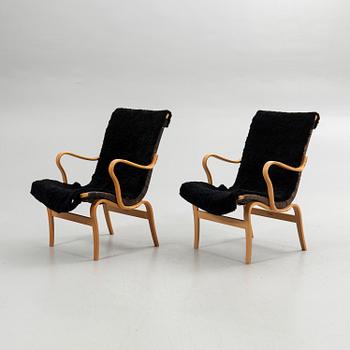 Bruno Mathsson, armchairs, a pair, "Eva", Bruno Mathsson International, Värnamo, second half of the 20th century.