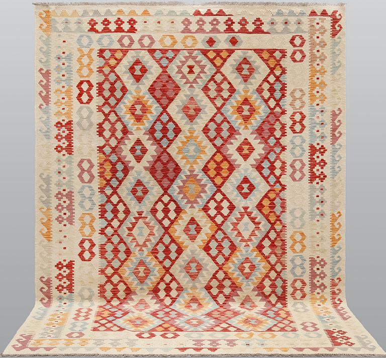 A Kilim carpet, ca 294 x 214 cm.