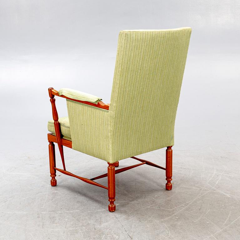 A Josef Frank mahogany armchair model nr 880 Firma Svenskt Tenn.