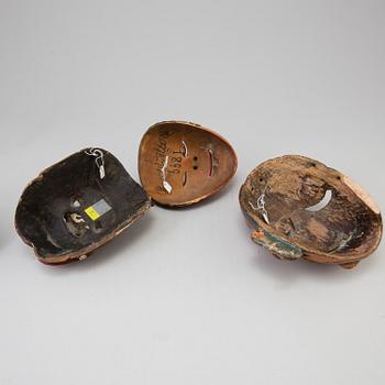 A group of dancing maskes, mostly Japanese Bugagku masks, Meiji period (1868-1912).