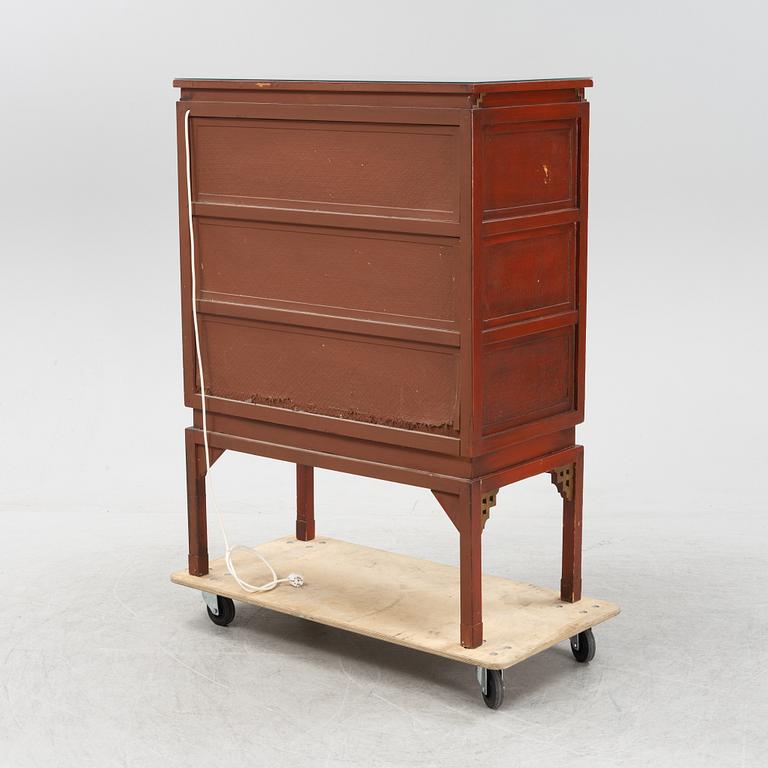 A bar cabinet, purchased in Tokyo around the 1950s. Partly built by late Qing dynasty panels.